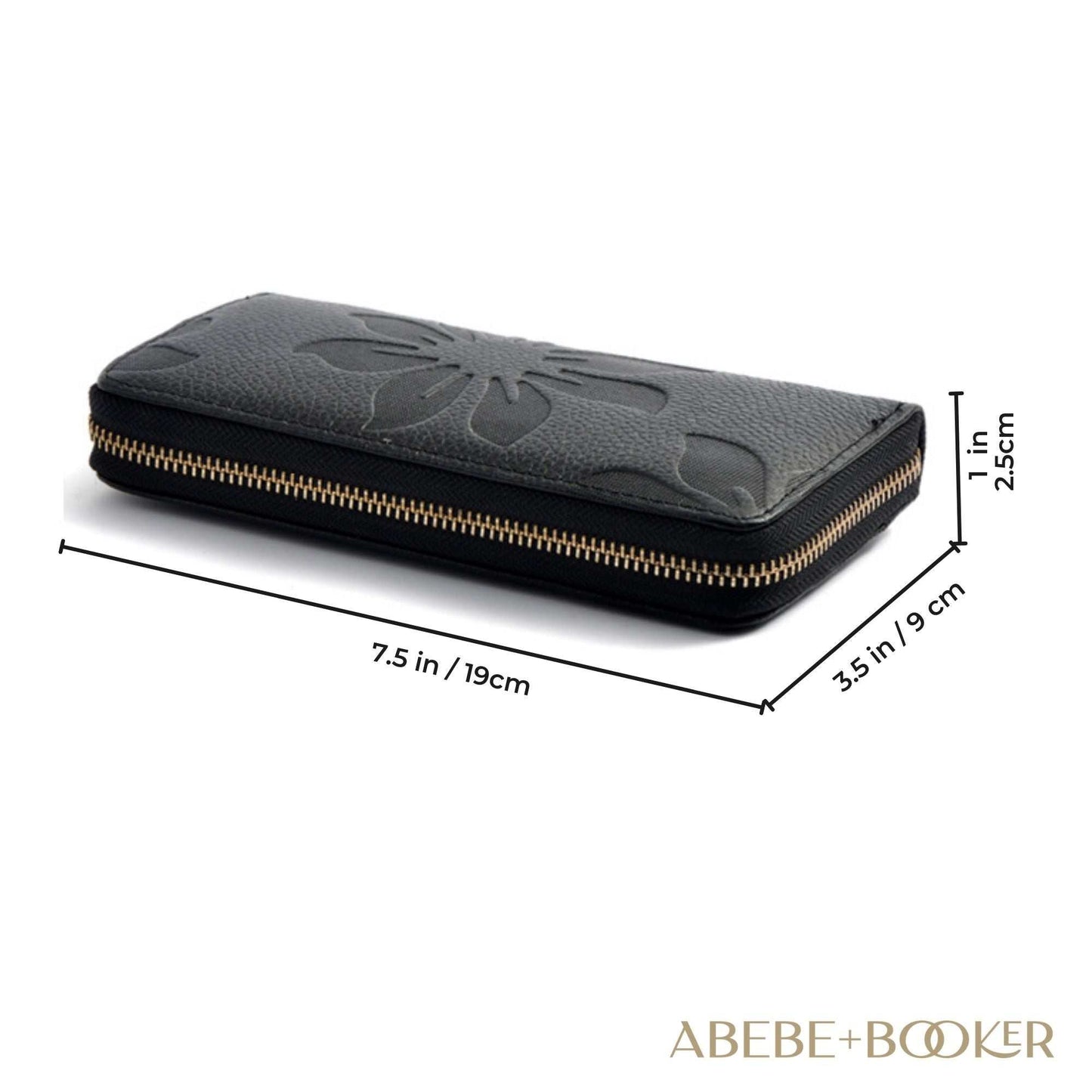 Ladies leather floral wallet with zipper, measuring 7.5 x 3.5 x 1 inches, genuine leather, black.
