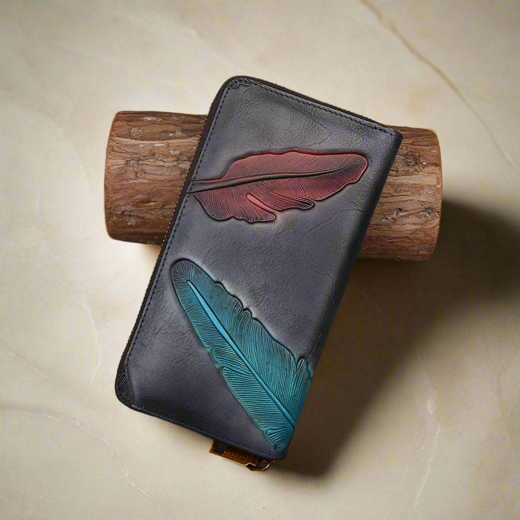 Handcrafted leather womens wallet with embossed leaf design for elegance and durability.