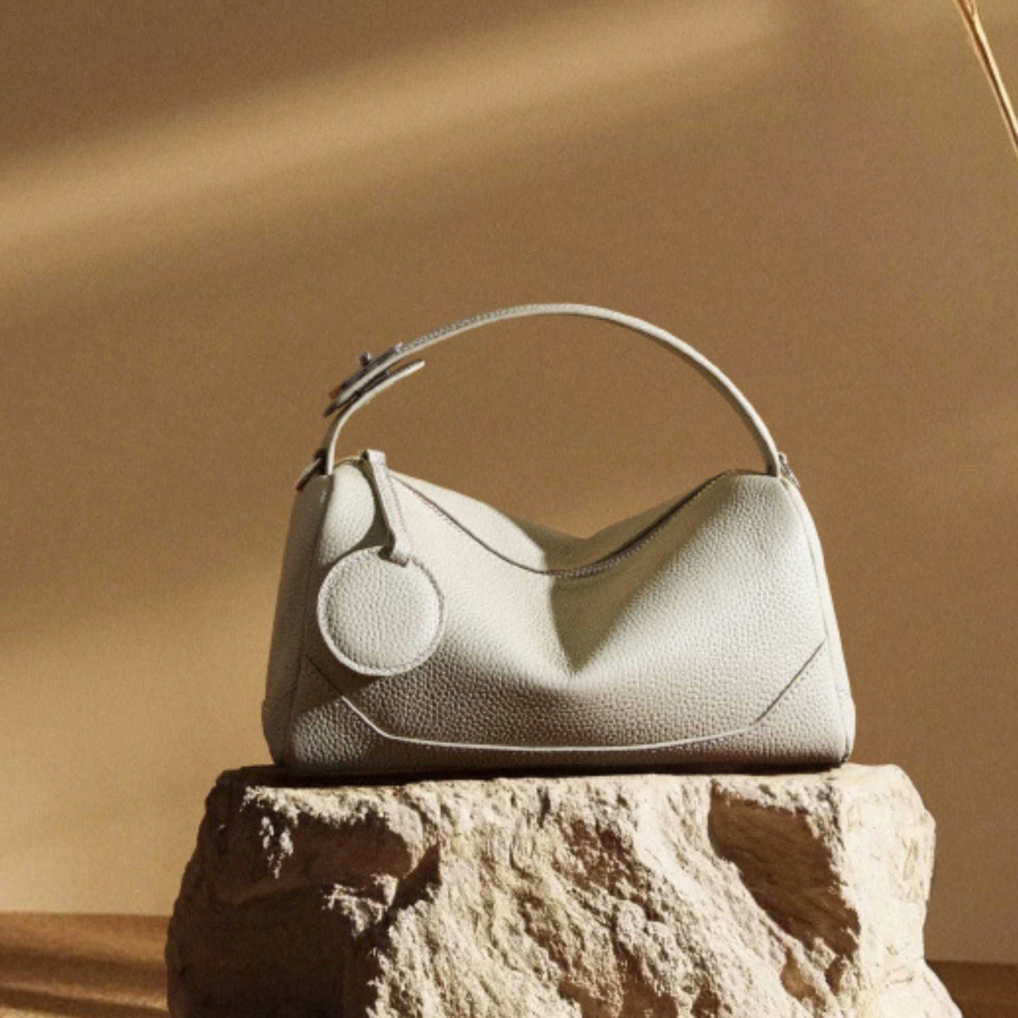 Petite Modern Lychee Leather Handbag on display, showcasing genuine lychee-patterned leather and versatile design.
