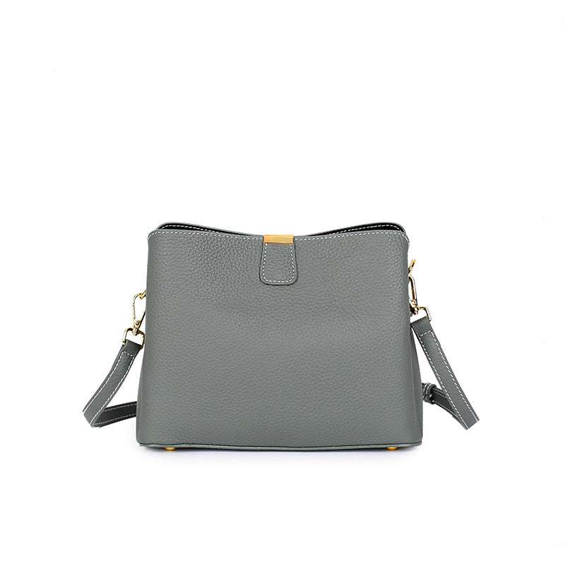 Genuine leather small crossbody purse with adjustable straps, perfect for versatile everyday use.