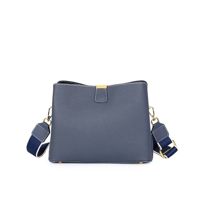 Genuine leather small crossbody purse with adjustable straps and versatile design.