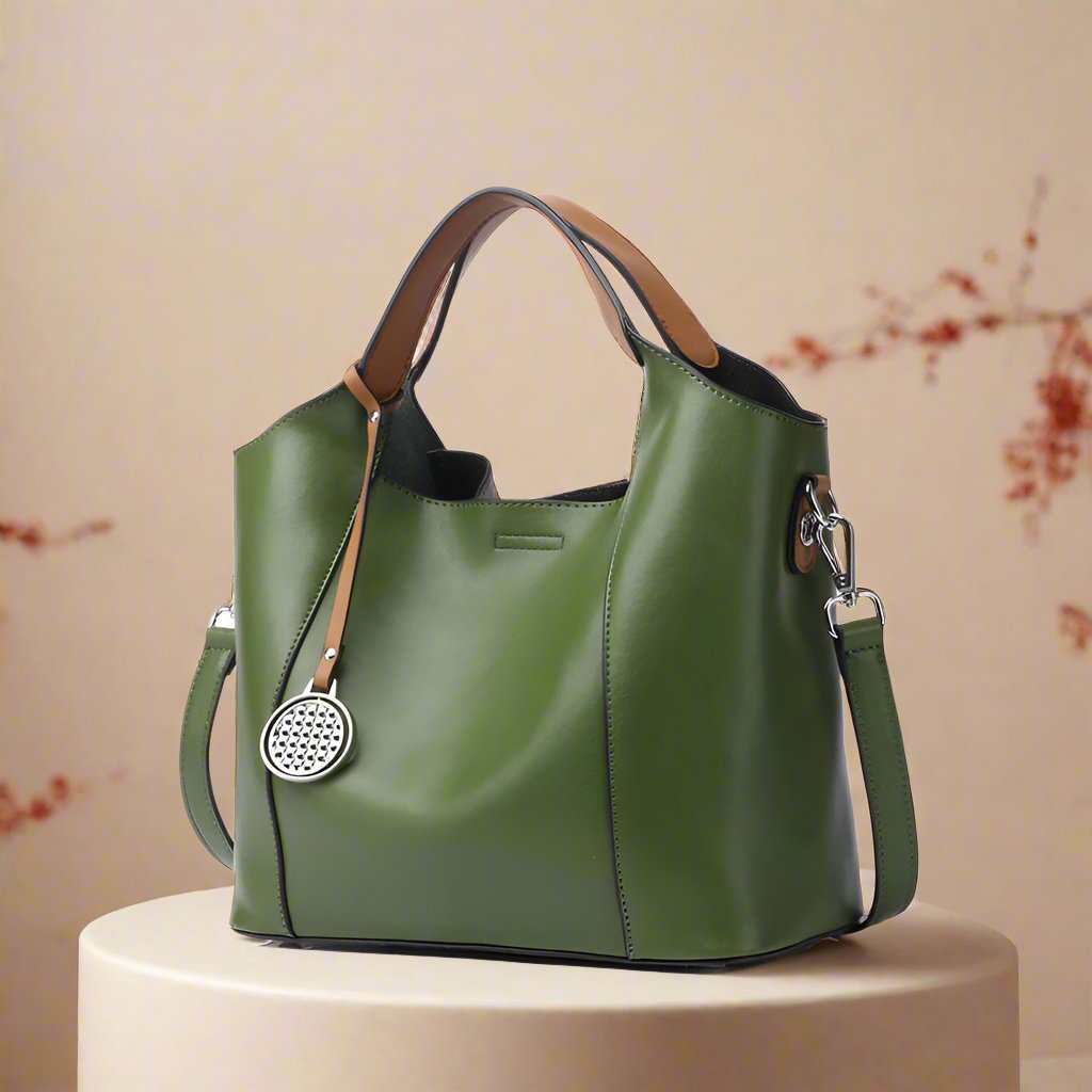 Green leather work bag with versatile design and spacious interior.