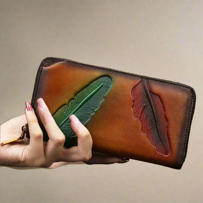 Handcrafted leather womens wallet with embossed leaf design, showcasing nature-inspired elegance and premium quality.