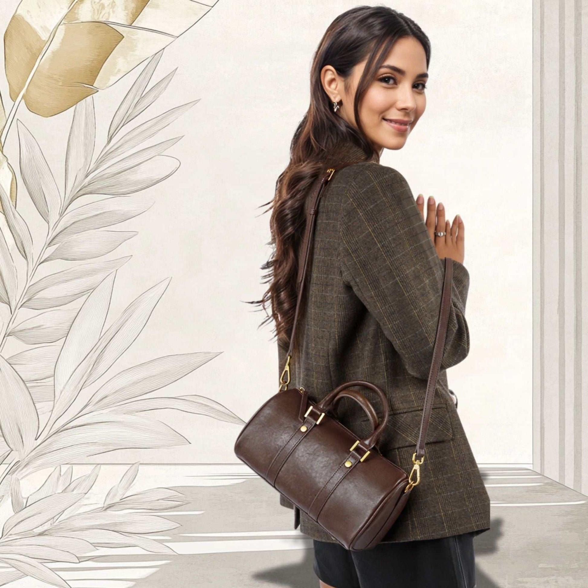 Classic Leather Barrel Handbag with gold hardware, genuine leather, versatile strap, suitable