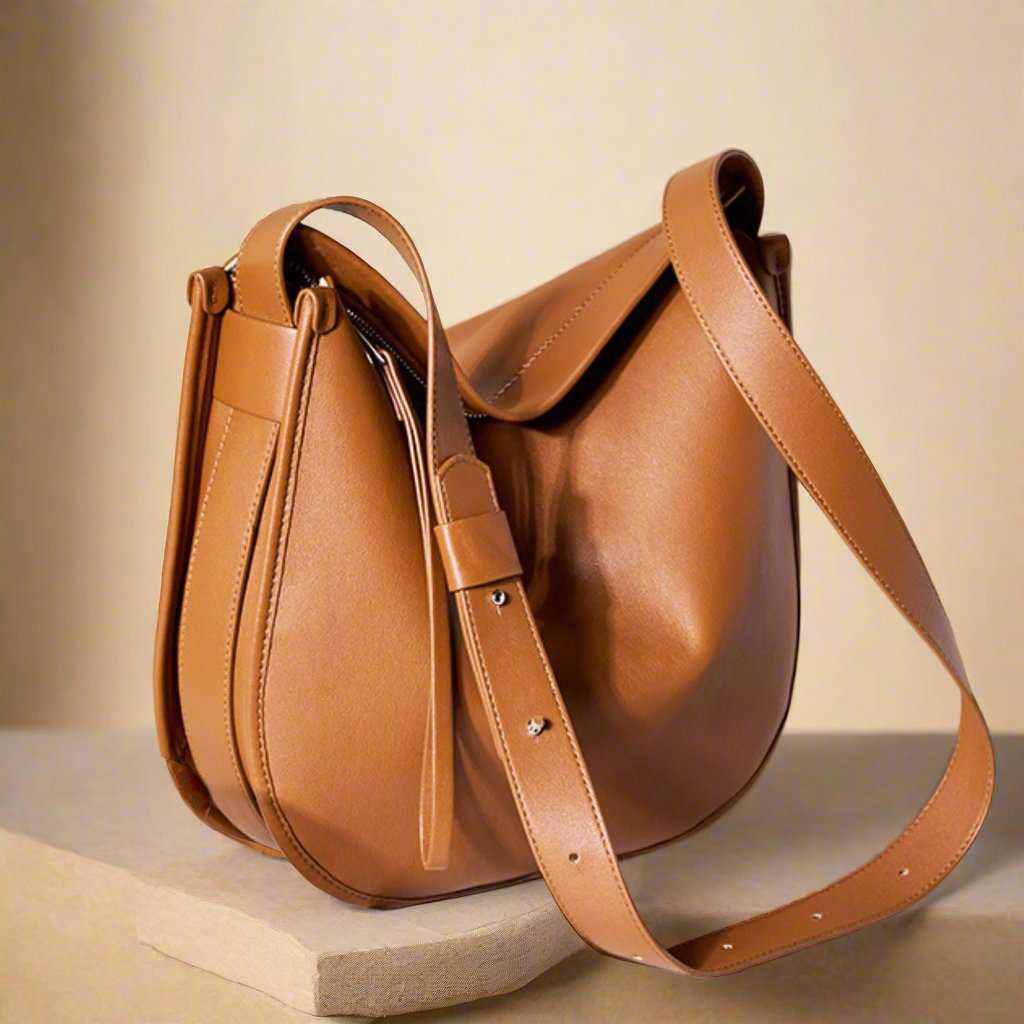 Large Crossbody Satchel in genuine leather, structured design, brown color.