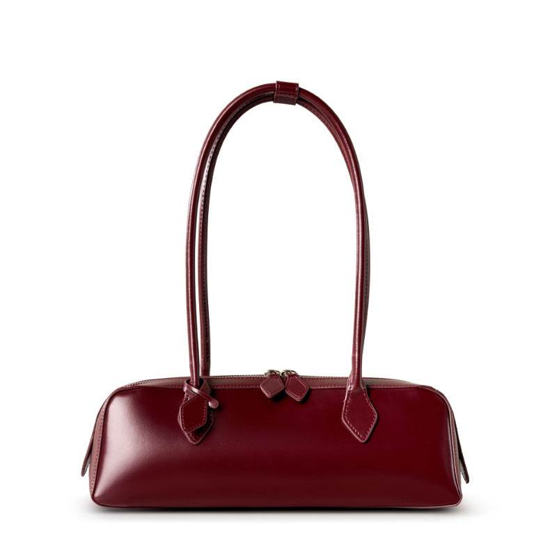 Leather baguette bag in burgundy, sleek design, full-grain leather, durable, and