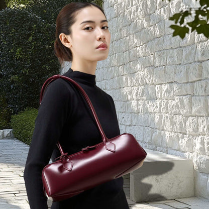 Woman wearing a Leather Baguette Bag with