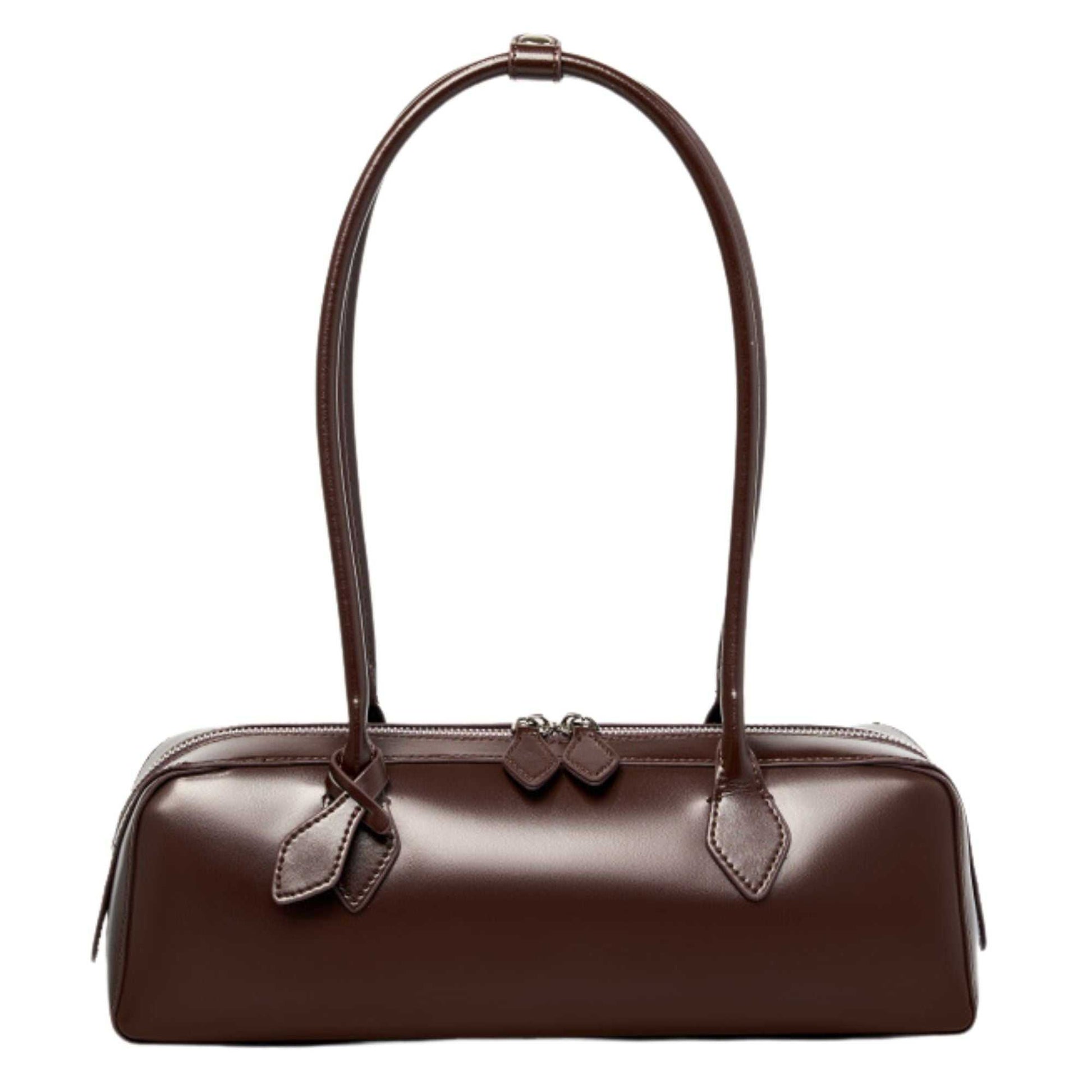 Leather Baguette Bag with rolled handles in dark brown full-grain leather, featuring