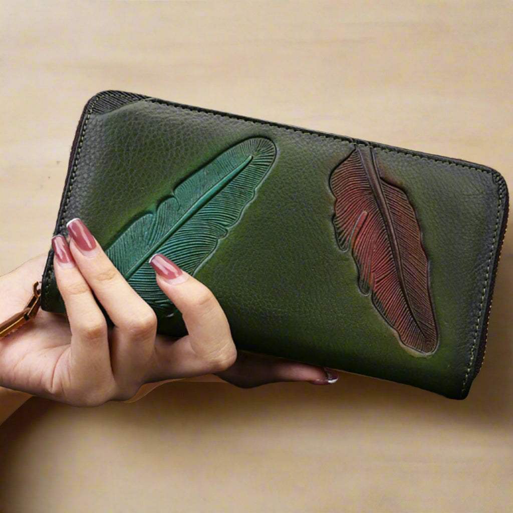 Handcrafted leather womens wallet with embossed leaf design, featuring 8 card slots and multiple compartments.