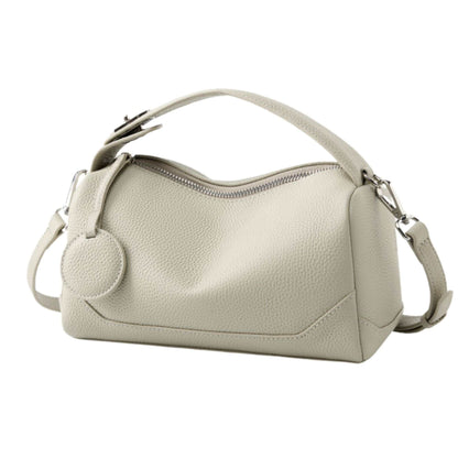 Petite modern lychee leather handbag with genuine leather, compact design, versatile strap, and sleek style.