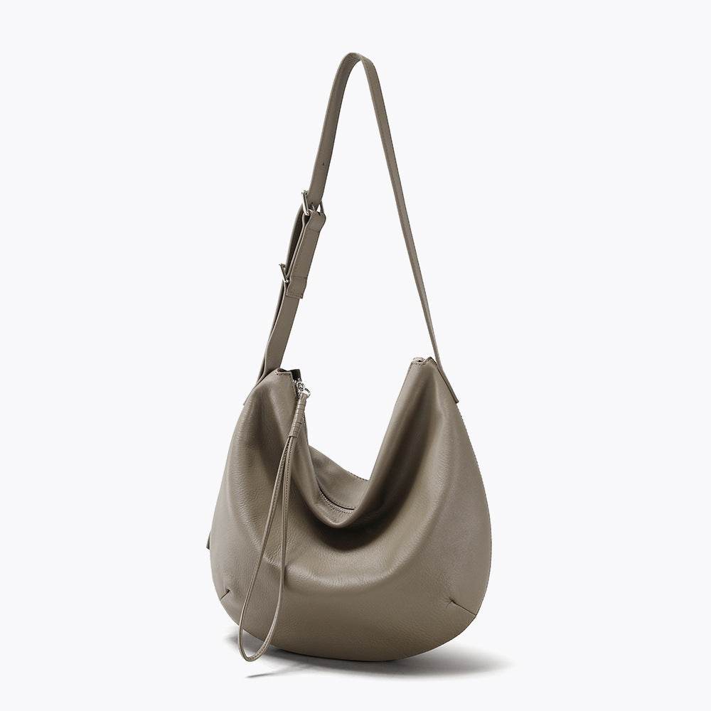 Slouchy crossbody bag in genuine leather with adjustable