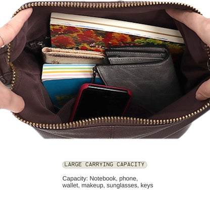 Slouchy Leather Hobo Bag with large carrying capacity, perfect for organizing essentials like a notebook, phone, wallet, makeup, sunglasses, and keys.
