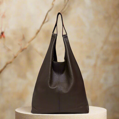 Slouchy Leather Hobo Bag on display, showcasing its sleek design and premium genuine leather material.