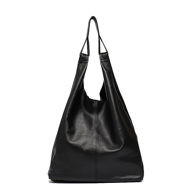 Slouchy leather hobo bag with black color, featuring a soft, premium leather finish and spacious interior for