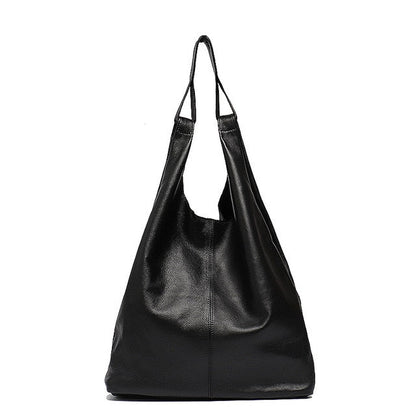 Slouchy leather hobo bag with black color, featuring a soft, premium leather finish and spacious interior for