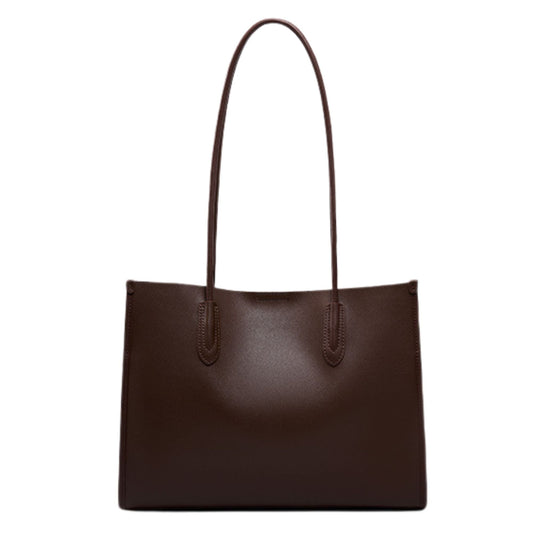 Brown genuine leather tote bag with long straps and minimalist design.